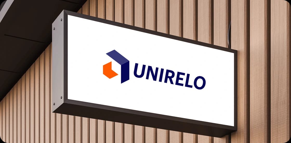 UniRelo signboard mounted against a wooden wall