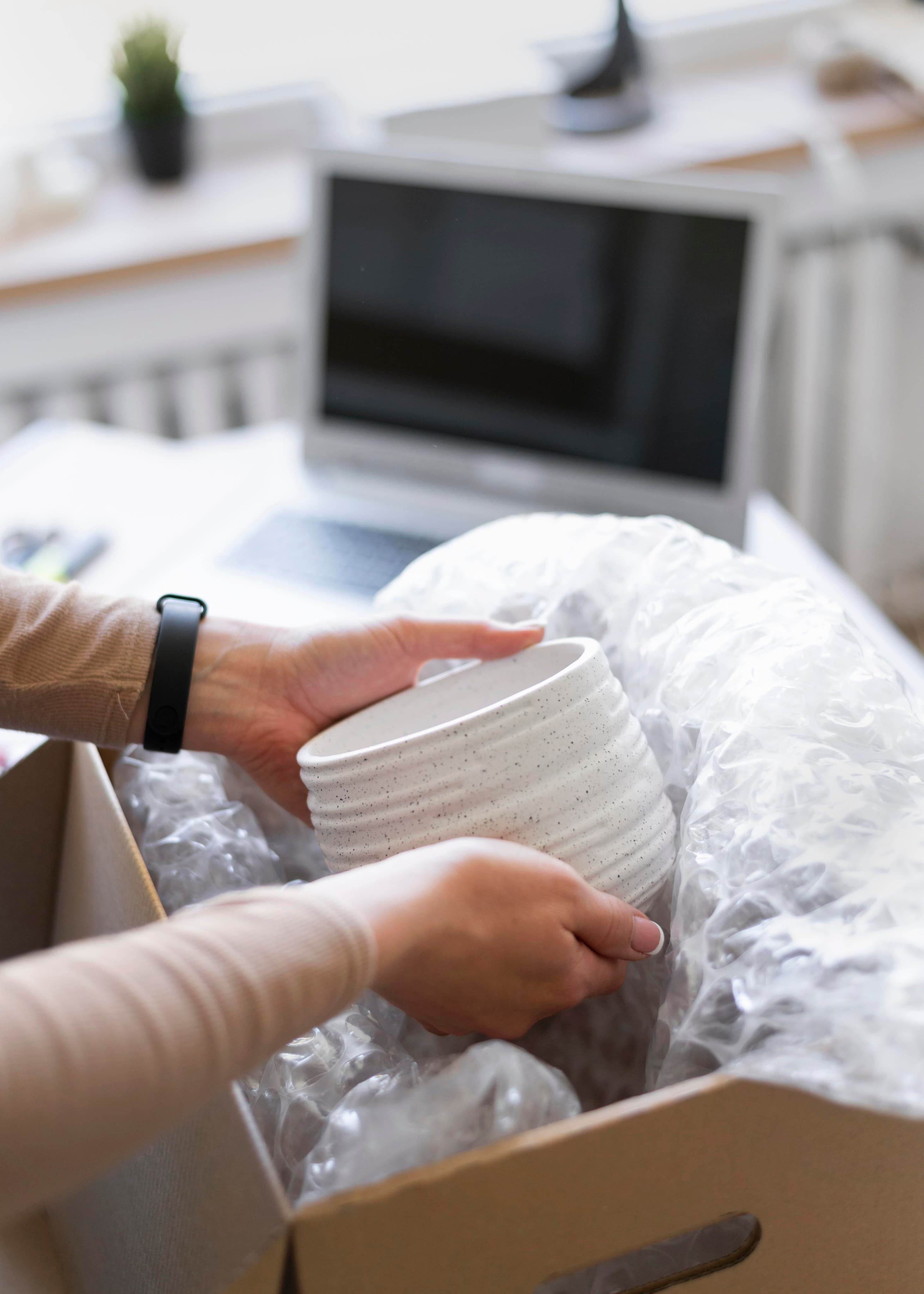 Packed furniture and protected household goods prepared for relocation